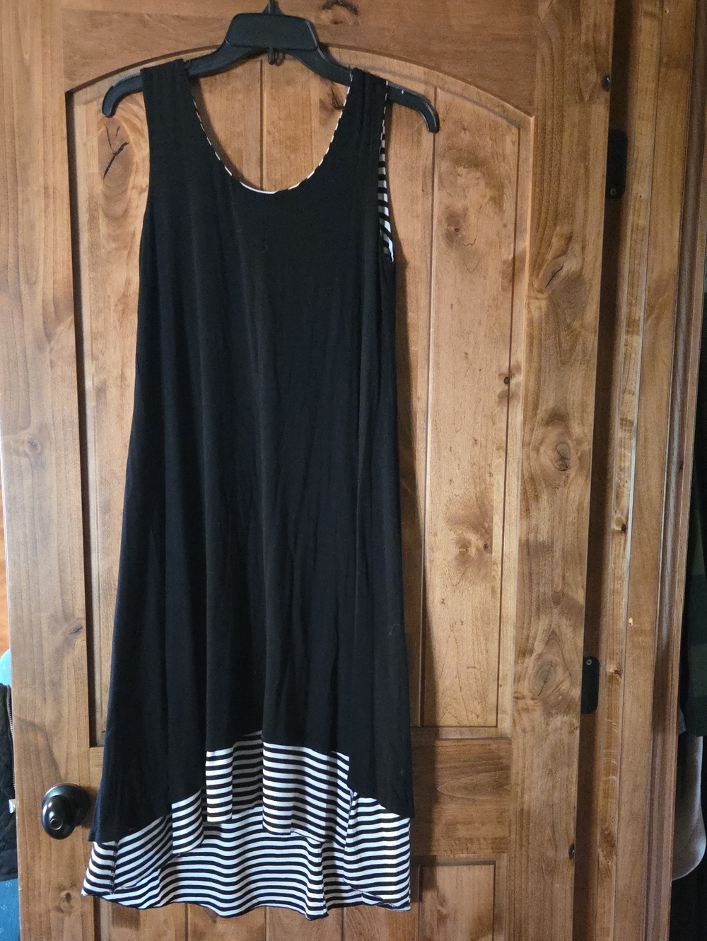 Black Sleeveless High-Low Dress with Striped Hem